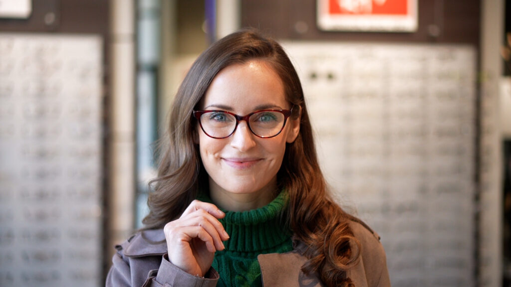 Stylish woman in optical shop