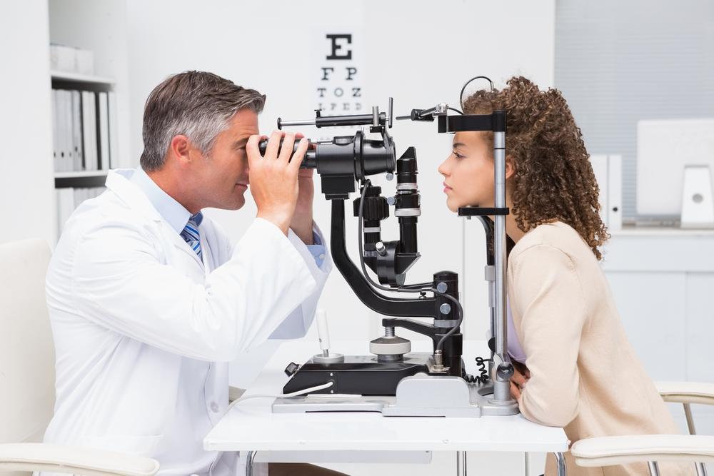 Woman having her eyes examined